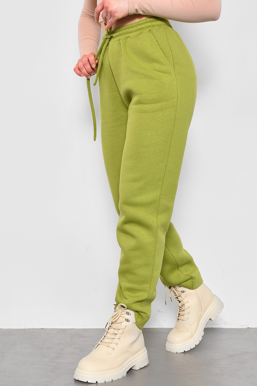 Спортивні штани жіночі на флісі салатового кольору 174711P