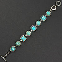 Браслет жіночий сріблястого кольору круглий із бірюзовими камінчиками застібка тогл завдовжки 22 см ширина 14 мм