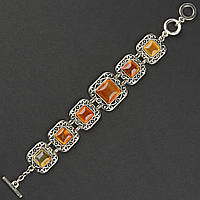 Браслет жіночий сріблястого кольору з візерунками та рутиловим кварцом застібка тогл довжина 22 см ширина 25 мм