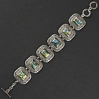 Браслет жіночий сріблястого кольору з різнобарвним камінням галіот застібка тогл довжина 22 см ширина 25 мм