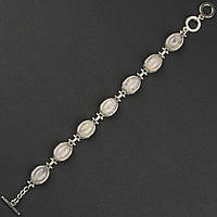 Браслет жіночий сріблястого кольору з місячними камінцями та візерунками застібка тогл довжина 22 см ширина 11 мм