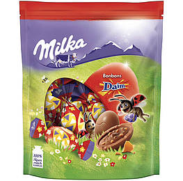 Milka Bonbons Daim Ostern Цукерки зі шматочками карамелі Daim 86g