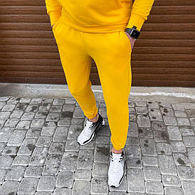 Модні спортивні штани чоловічі однотонні базові жовтогарячі штани для спорту на хлопця чоловіка повсякденні