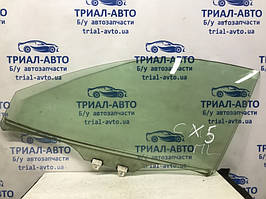 Скло дверей переднє ліве Mazda