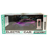 Машинка металева Tesla Model Y Electrocar Тесла Модель Y Електрокар фіолетова 1:24 зарядна станція звук світло відч двері капот, фото 10