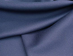 Костюмна вовняна тканина темно-синього кольору