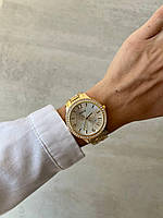 Жіночий модний годинник металевий золоті з жовтим циферблатом