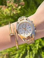 Жіночий стильний золотистий годинник на руку на металевому ремінці