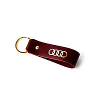 Брелок-петля с логотипом "Audi" бордо с позолотой.