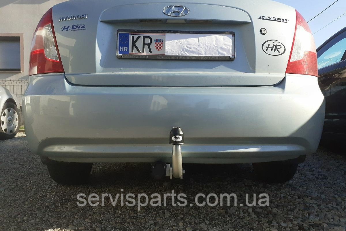 Фаркоп Hyundai Accent MC 2006-2011 (Хендай Акцент) оцинкований без підрізу бампера