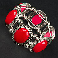 Браслет на руку широкий на гумці метал зі сріблястими елементами та візерунками з кораловим камінням ширина 3 см