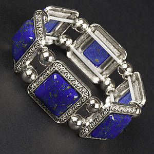 Браслет на руку широкий на гумці метал зі сріблястими елементами та візерунками з камінчиками лазурит ширина 30 мм