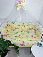 Постельный набор в детскую кроватку (8 предметов) Premium "Дино" желтый