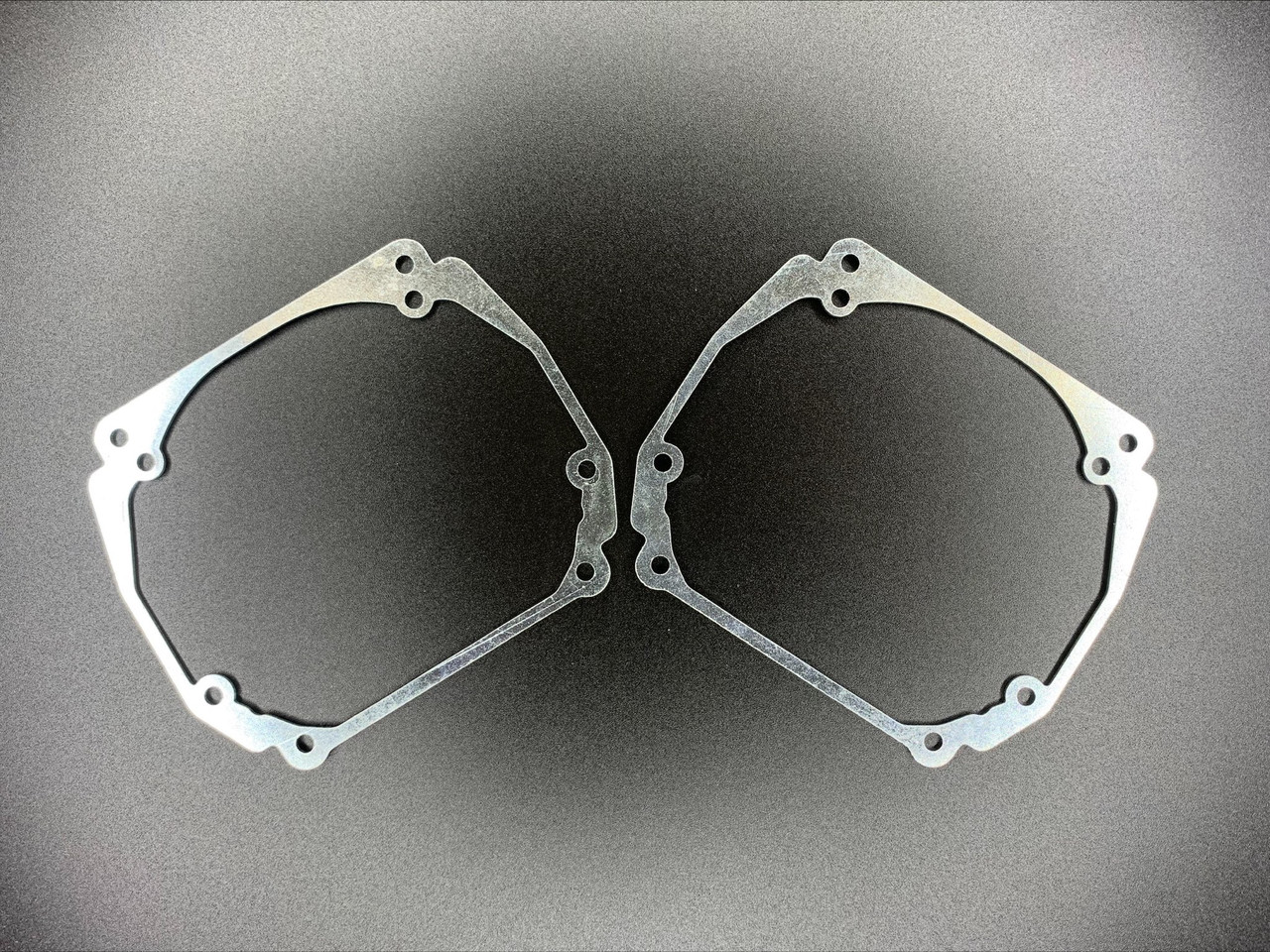 Перехідні рамки для заміни лінз Volkswagen Passat B6 дорестайл 2005-2008 у фари автомобіля 103303