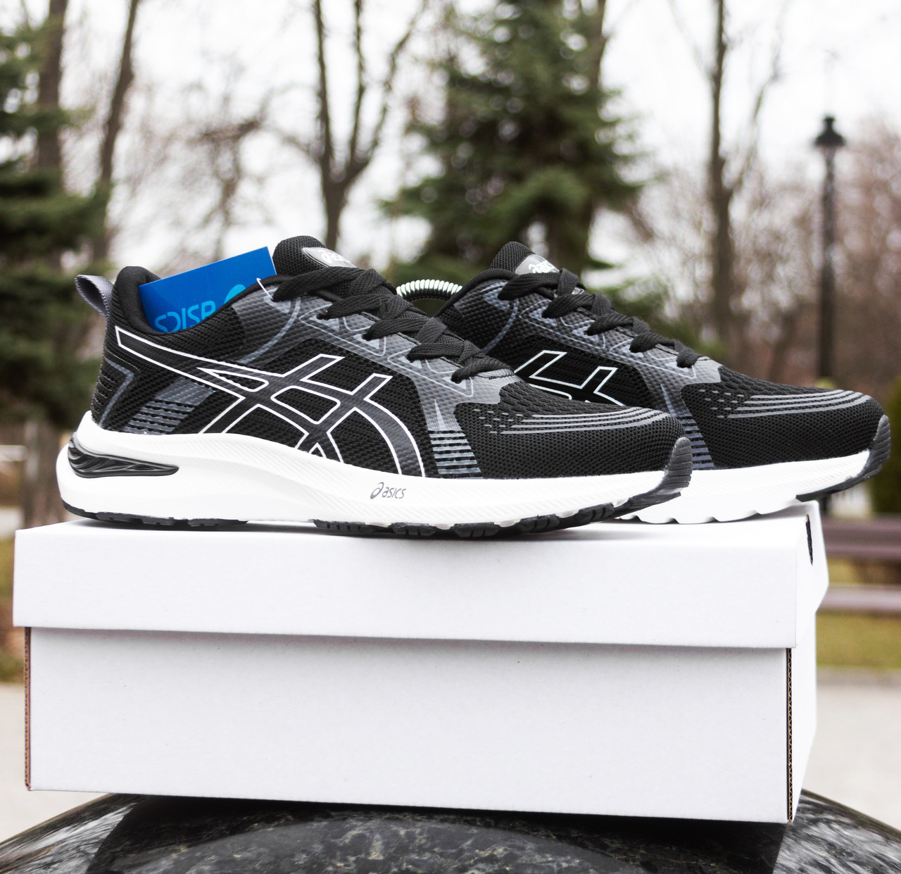 РОЗПРОДАЖ Кросівки Asics чорні з білою підошвою