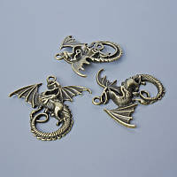 Фурнітура підвіска "Дракон" d-43х45,5мм, d-отвору 2,8мм, фас. 1шт. бронзовий колір металу купити біжутерію дешево оптом в