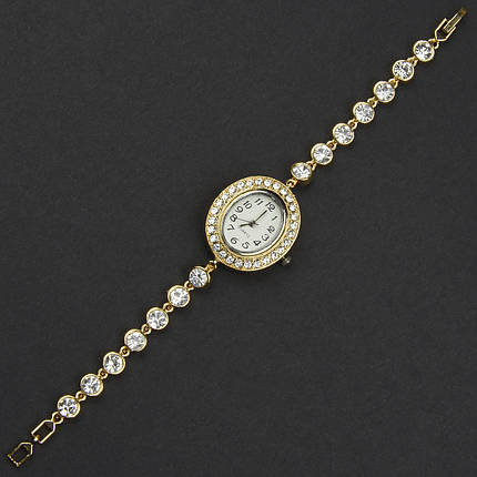 Женские часы овальные кварцевые бижутерныйл металл в серебристом цвете с белыми кристаллами длина 19 см, фото 2