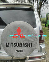 Чехол для запасного колеса Mitsubishi Pajero (Мицубиси Паджеро). цвет серый + логотип. Изготовление 1 день.