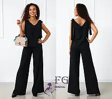 Трикотажний жіночий літній костюм із широкими штанами