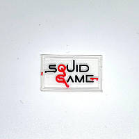 Нашивка Squid Game Гра в кальмара 40х25 мм (прозора)