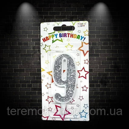 Свічка цифра 9 біла з сріблом