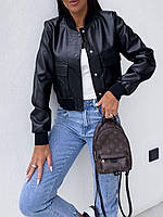 Жіноча молодіжна шкіряна куртка-бомбер із накладними кишенями чорна
