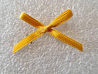 Бантик декоративный, пришивной. Цвет - желтый. Размер 25*25 мм, №087