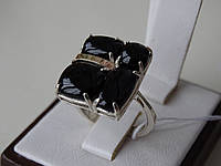 Эксклюзивное серебряное кольцо с золотой пластиной и ониксом