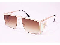 Солнцезащитные очки коричневые в золотистой оправе с боковыми стеклами