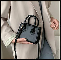 Маленька жіноча сумка через плече чорного кольору сумка 14.6 см*8см*11см
