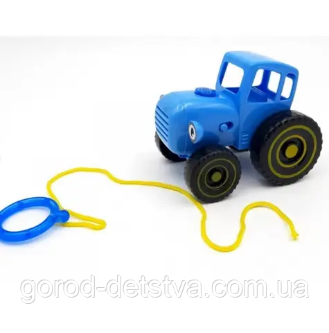 Синій Трактор на шнурку музична іграшка дитяча каталка TK 11203 пісні українською Світло Звук, фото 1