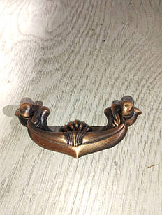 Комодна ручка 64 мм мідь на планці