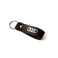 Брелок-петля з логотипом авто "Audi" темно-коричневий з посрібленням.