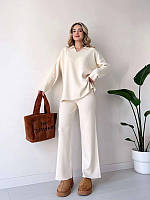 Стильний якісний жіночий костюм в рубчик мустанг комплект кофта і брюки однотонний