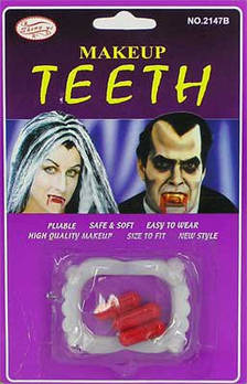 Зуби Вампіра і капсули з кров'ю - ефектний образ гарантовано!