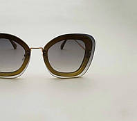 Солнцезащитные очки женские Miu Miu (Миу Миу) брендовые, стильные безободковые зеленые очки бабочки