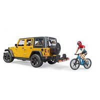 Машинка Bruder Джип Jeep Wrangler Unlimited Rubicon с фигуркой велосипедиста 02543