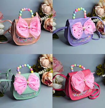 Дитяча сумочка з бантиком 13*12 см у різних кольорах Luna