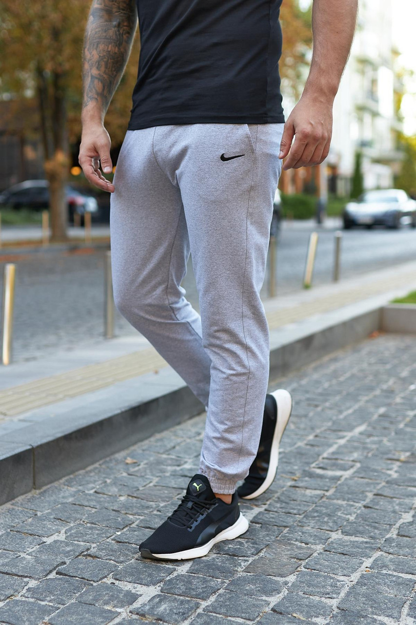 Чоловічі спортивні штани Nike сірі весняні осінні Найк бавовняні на резинці, фото 1