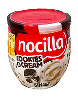 Молочно-фундукова паста зі шматочками шоколадного печива Nocilla Cookies & Cream, 180 г (8410014493392)