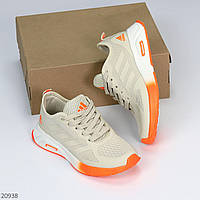 Комбіновані фактурні світлі кросівки мікс колір бежевий оранж
