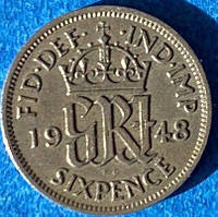Монета Великобританії 6 пенсів 1948 р.