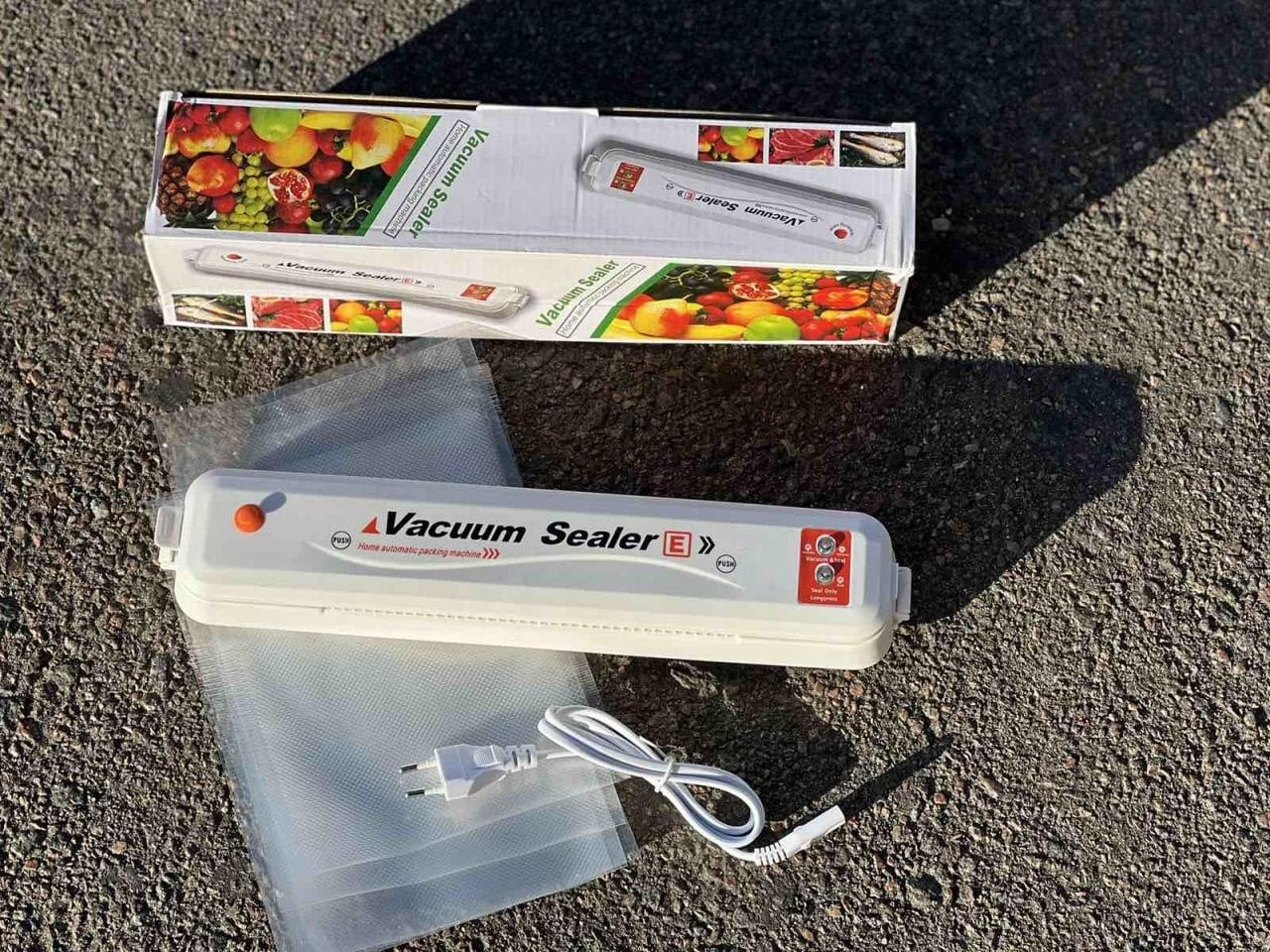 Вакуумний пакувальник апарат для вакуумного пакування продуктів