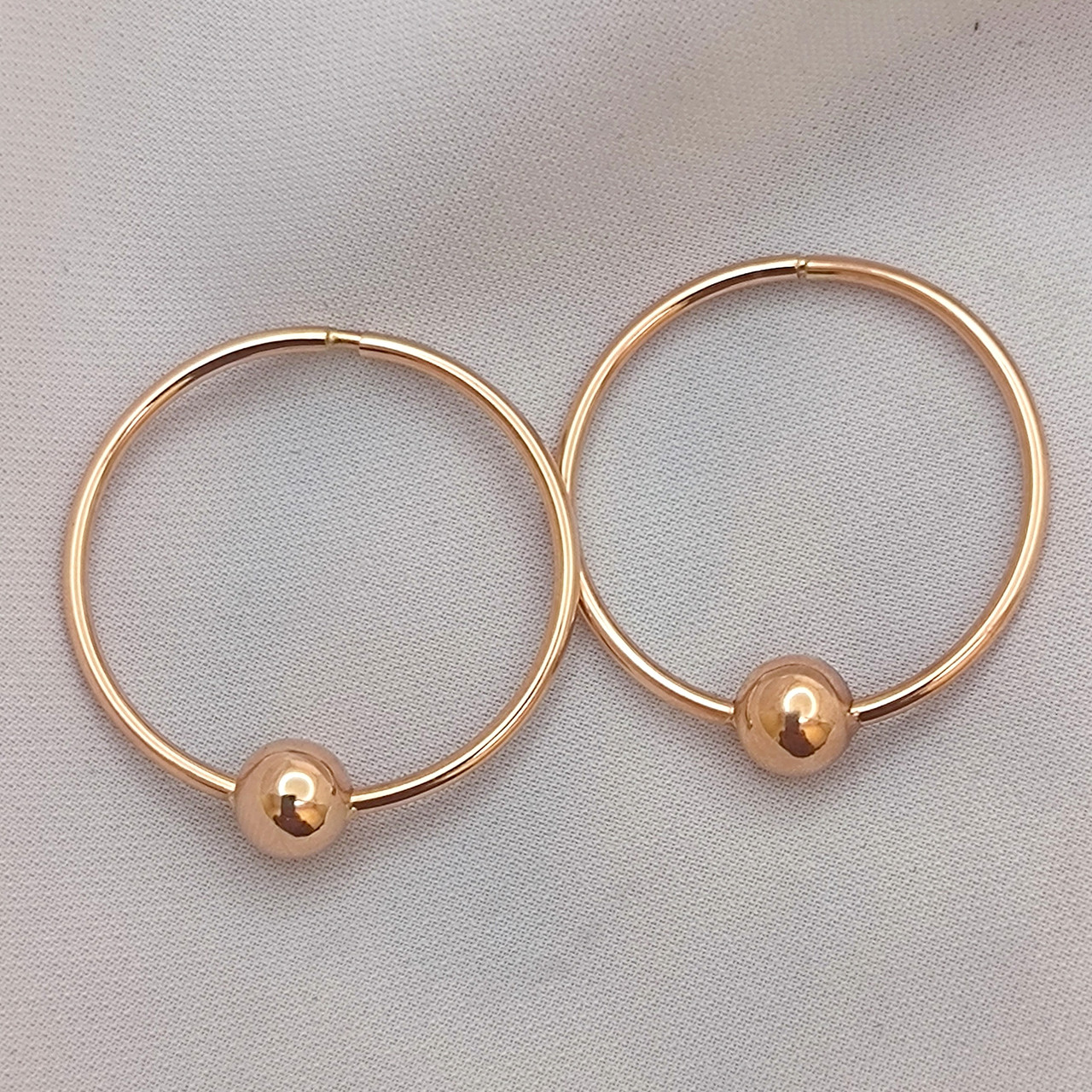 Золоті сережки 585 проби.сережки кільця з шарикомсерьги конго