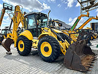 Екскаватор-навантажувач New Holland B115 - 2009 рік