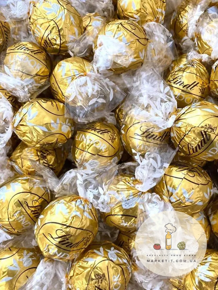 Шоколадные конфеты Lindt Lindor Weiss, белый шоколад с пралине, весовые - фото 2 - id-p2154116988