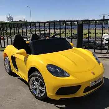 Дитячий електромобіль Porsche. Навантаження до 100 кг. 180W. Шкіряне сидіння. 24V/7AH. Світло. Жовтий. M