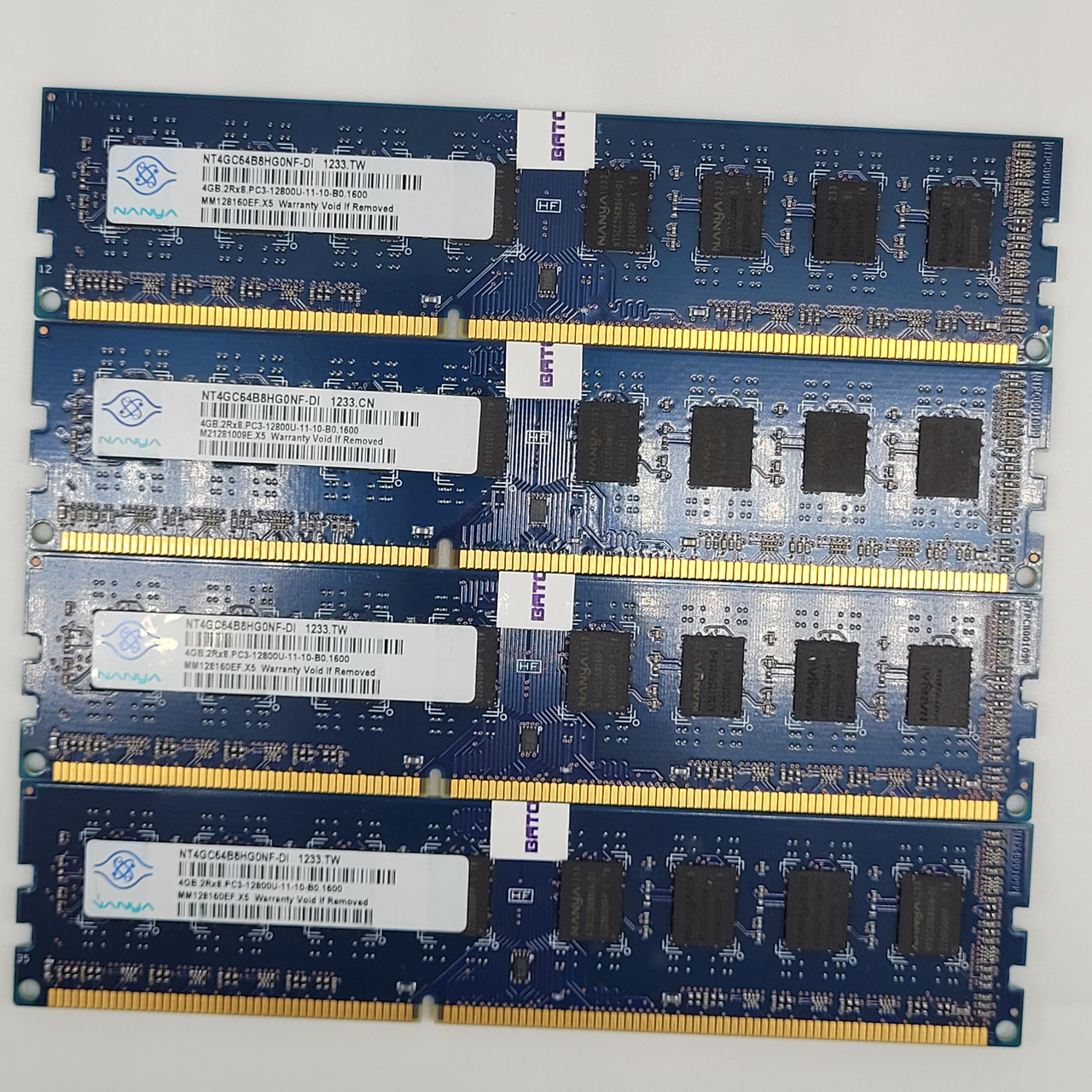 Комплект оперативної пам'яті Nanya DDR3 16Gb (4x4Gb) 1600MHz PC3-12800U 2R8 CL11 (NT4GC64B8HG0NF-DI) БВ
