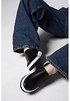 Жіночі сліпони чорного кольору з натуральної шкіри з білою підошвою