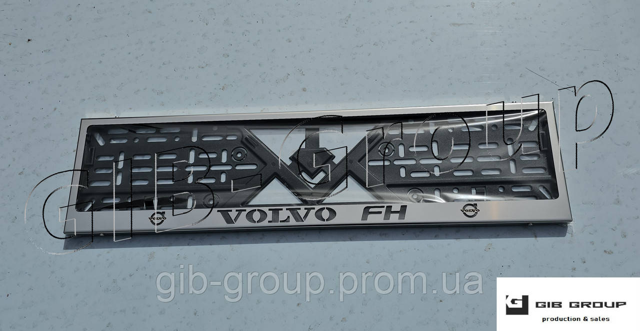 Рамка номерного знаку з написом та логотипом "Volvo FH"